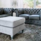 grey leather couch with grey rug