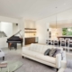 dining and living room combo with grey area rug.