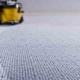 professional carpet cleaning with a yellow machine