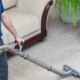 professional carpet cleaning by a man