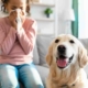 girl wiping her nose and a dog