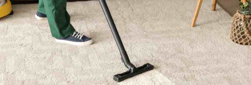 vacuuming white carpet